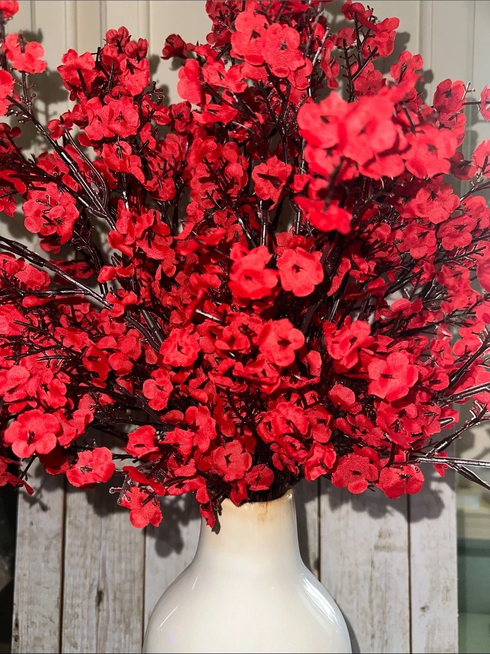 Red Floral Cherry Blossoms in White Decorative Vase